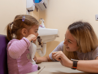 occupational therapist and child 