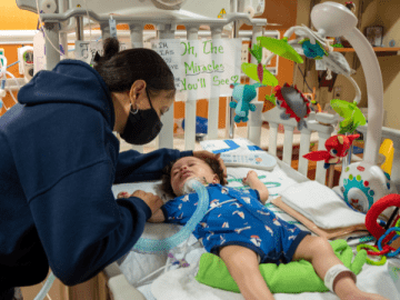 mom comforting medically fragile baby