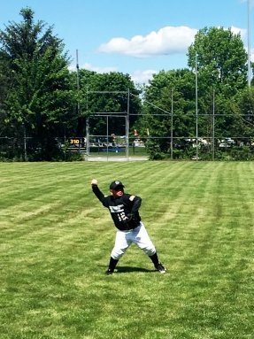 child plays baseball