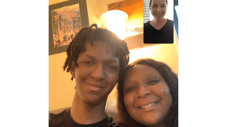 child with parent on facetime call 