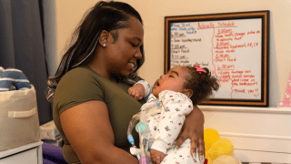 Mom and baby looking at one another