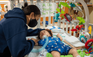 mom comforting medically fragile baby