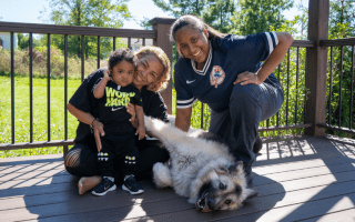 two mothers with baby and dog