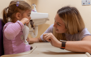 Child brushing teeth