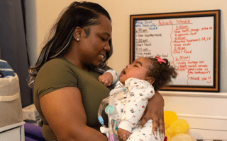 Mom and baby looking at one another