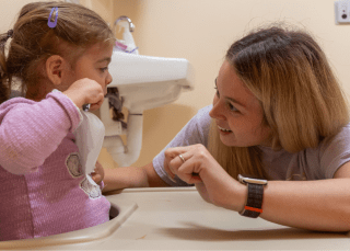 Child brushing teeth