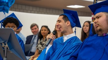 graduates giving speeches