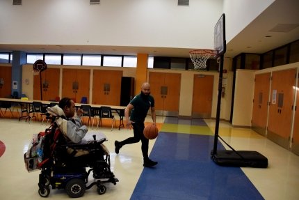 therapist playing basketball