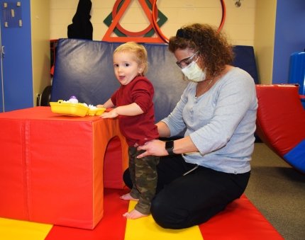 physical therapist and baby