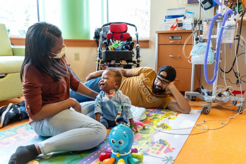 parents at bedside in a pediatric rehabilitation hospital